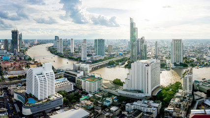 Obraz premium Aerial view curve Chao Phraya River Bangkok city downtown skyline of Thailand , Panoramic Cityscape Thailand