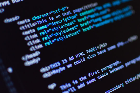 Software development. Software source code. Programming code. Writing programming code on laptop.	
