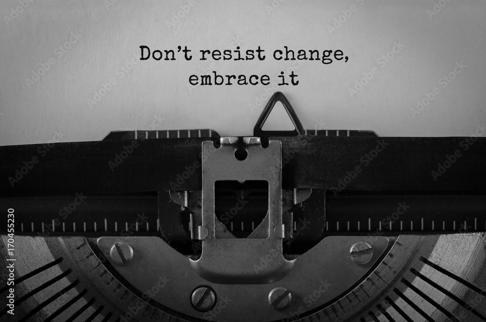 Aufkleber text do not resist change embrace it typed on retro typewriter