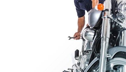 Cropped view of Motorcycle mechanic on white background