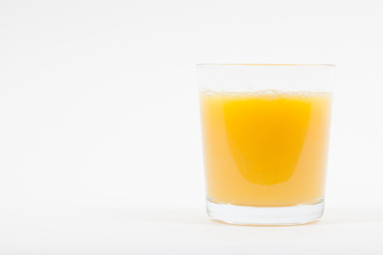 Glass of isolated fresh orange juice