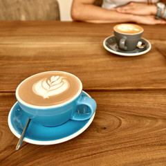 Cappuccino coffee on table