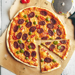 Pizza with spicy sausage