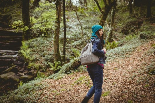 Woman hiking in countryside