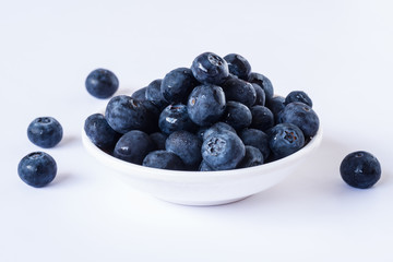 Blue Berry Fruits in a bowl, white back ground