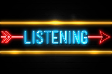 Listening  - fluorescent Neon Sign on brickwall Front view