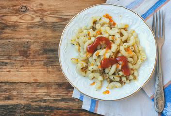 plate of pasta nautically c ground beef, ketchup, onions, carrots, vintage style