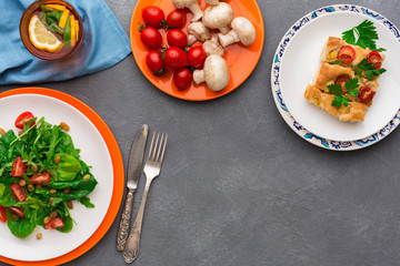Eating healthy food on gray background, top view, copy space.
