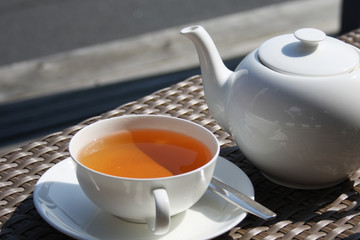 Teatime, Teetasse mit Darjeeling und Teekanne