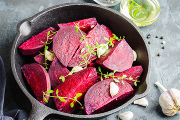 Raw beetroot with balsamic, garlic and herbs.  Selective focus, close up.