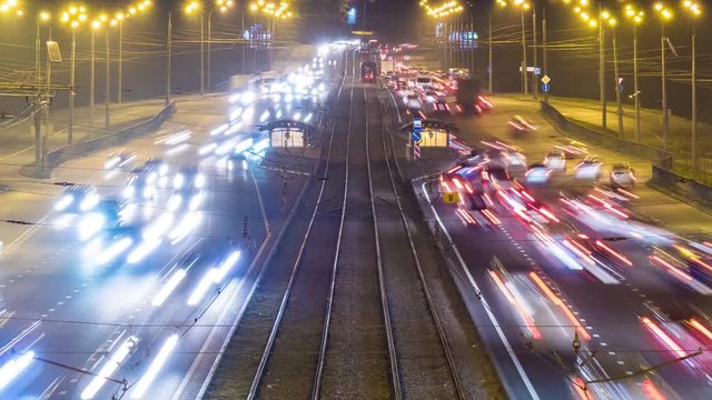 intensive road traffic on the road at night