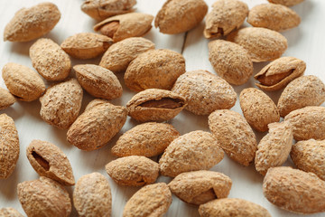 Almond in shell on a white table