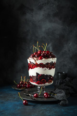  Сherry, cream cheese and chocolate  biscuit layered dessert in glass. black forest rifle