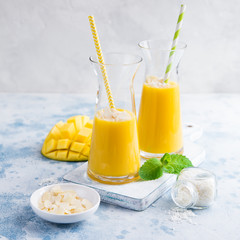 fresh mango smoothie with almond and coconut