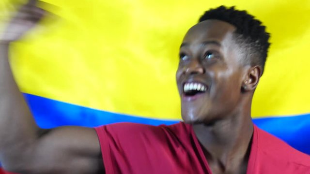 Colombian Guy Win with Colombia Flag