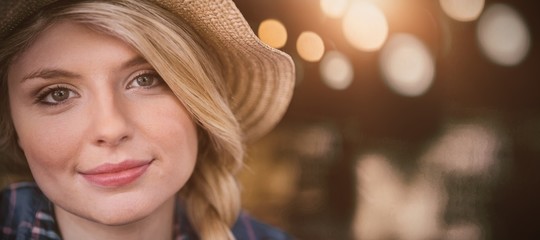 Young woman in hat at coffee shop