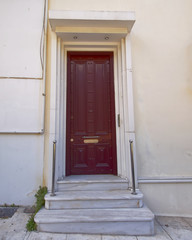 Fototapeta premium elegant house entrance with metallic door, Athens Greece