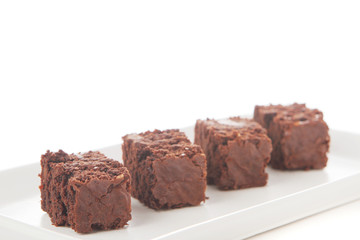 Homemade chocolate brownies served on a plate