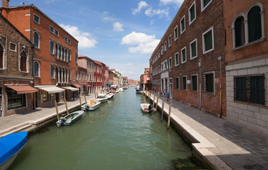 Murano Island, small village near the Venice / Panorama of the river canal and historical architecture