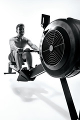 Man Using A Press Machine In A Fitness Club.