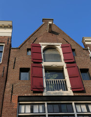 Fototapeta premium amsterdam house with hook near the roof to carry the furniture