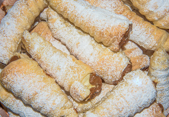 puff rolls with cream on white background