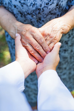 Shaking elderly hands