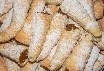 puff rolls with cream on white background