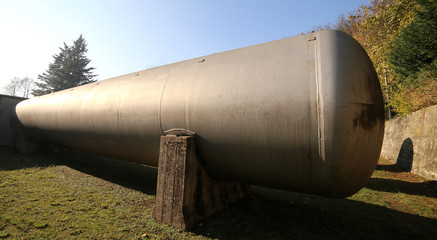 Huge gas storage tanks in an industrial area.