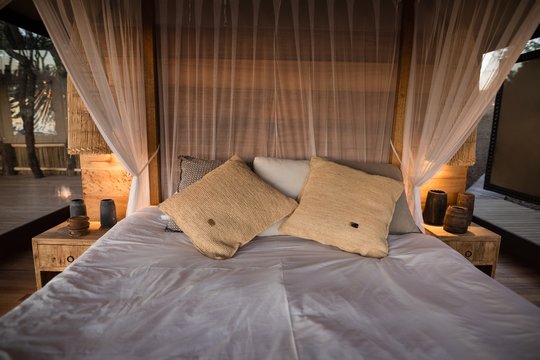 View of empty canopy bed