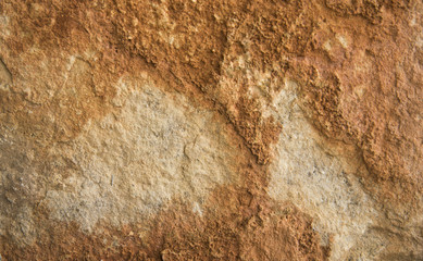 Worn orange (red) concrete stone wall texture.