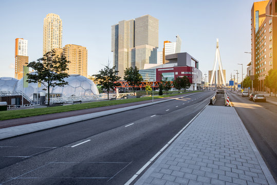 Cityscape view on the modern district at the Rijn port with skyscrapers during the morning in Rotterdam city