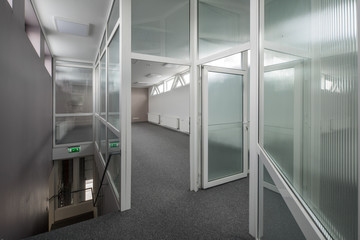 Office interior with glass walls.