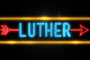 Luther  - fluorescent Neon Sign on brickwall Front view