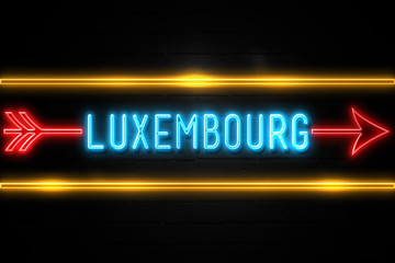 Obraz premium Luxembourg - fluorescent Neon Sign on brickwall Front view