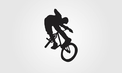 Fototapeta na wymiar Cyclist rider bmx performs trick jump logo silhouette vector