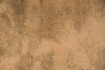 Worn orange (red) concrete stone wall texture.