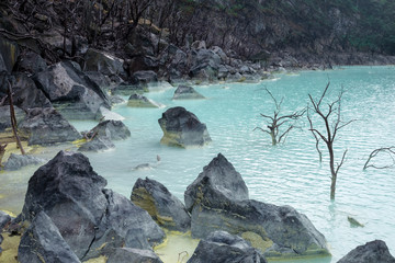 Kawah Putih - ancient volcanic crater with acid water, Indonesia
