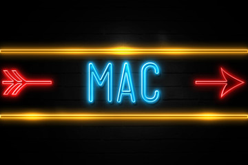 Obraz premium Mac - fluorescent Neon Sign on brickwall Front view