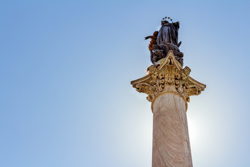 Backlit statue in Rome