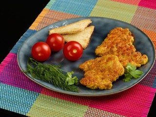 fried chicken filet on tablecloth