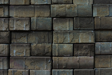 Gray paving slabs piled in piles