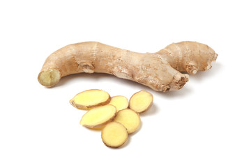sliced ginger root on white background