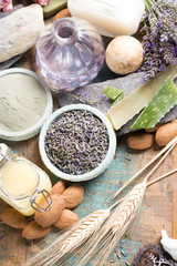Nature cosmetics, handmade preparation with essential oils and ancient minerals of perfume, creams, soaps from fresh and dried lavender and roses flowers, wheat, almond nuts, green clay powder