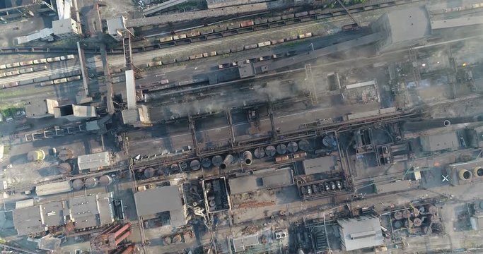 Industrial area top view, View of the industrial object, Courtyard of a factory, Aerial view, Smoke and fire, environmental pollution, environmental pollution, ecological disaster, panoramic view, 4K