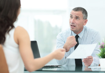 Image of business people interacting at meeting in office