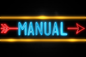 Obraz premium Manual - fluorescent Neon Sign on brickwall Front view