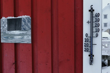 Zero degree temperature-thermometer on red wall of rorbu. Hamnoy-Reine-Moskenesoya-Nordland-Norway. 0369