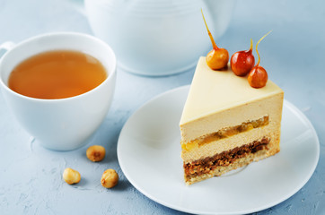 Caramelized white chocolate dried apricots hazelnut mousse cake