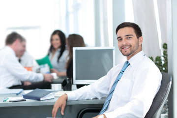 Obraz premium Business concept - handsome happy business man in office.